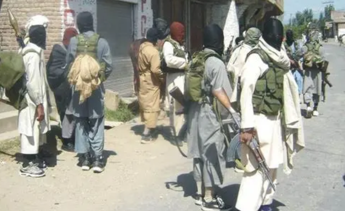 al qaeda militants standing around